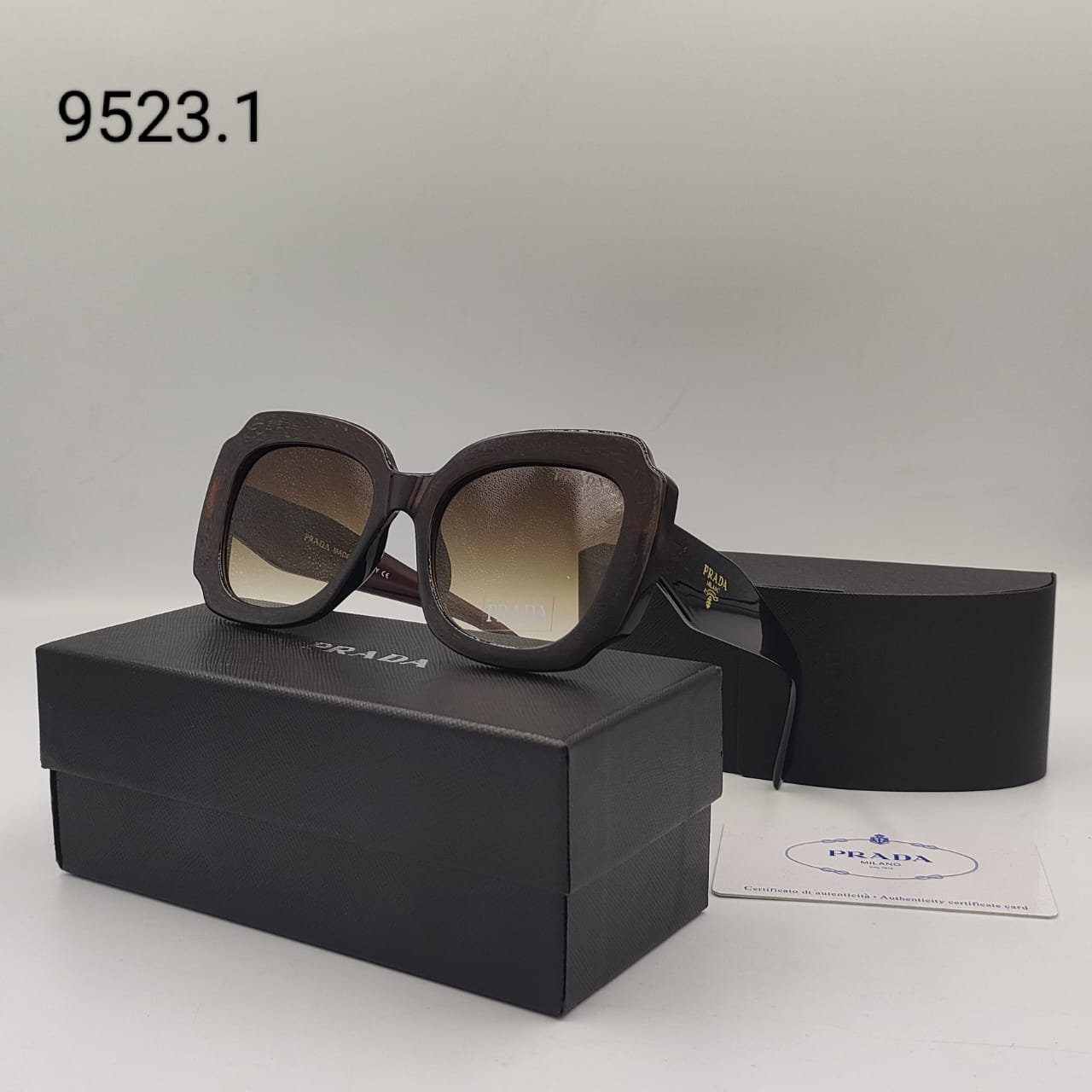 PRADA SUNGLASSES